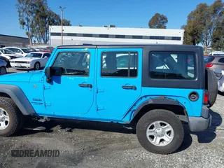 2018 Jeep Wrangler Unlimited Sport with VIN 1C4BJWDG8JL909376, listed as a IAAI auction lot 41632019 with 40,968 mi miles and . Bid and sale history available at DreamBid. Image 14.