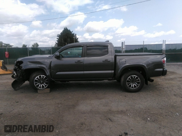2021 Toyota Tacoma SR z VIN 3TYCZ5AN7MT017377, wystawiony jako IAAI lot #42285326 z przebiegiem 91 657 mil mil oraz . Historia ofert i sprzedaży dostępna na DreamBid. Obrazek 14.