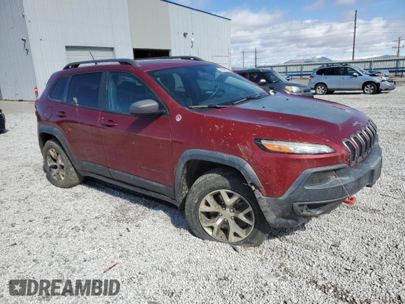 2014 Jeep Cherokee Trailhawk with VIN 1C4PJMBS7EW157305, listed as a Copart auction lot 49436685 with 138,446 mi miles and Salvage Title. Bid and sale history available at carsss.com. Image 4.