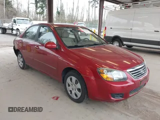 2009 Kia Spectra LX with VIN KNAFE222195667582, listed as a IAAI auction lot 41836327 with 96,745 mi miles. Bid and sale history available at carsss.com. Image 1.