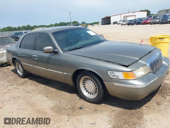 2002 Mercury Grand Marquis LS Premium z VIN 2MEFM75W22X617584, wystawiony jako IAAI lot #42444579 z przebiegiem 199 914 mil mil oraz . Historia ofert i sprzedaży dostępna na DreamBid. Obrazek 1.