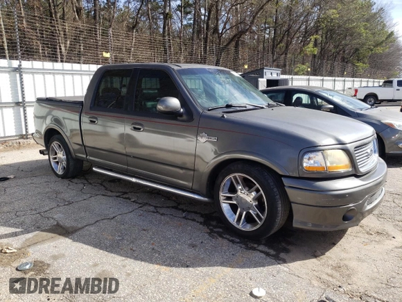 2002 Ford F-150 Harley Davidson with VIN 1FTRW07312KD72573, listed as a Copart auction lot 44971685 with 0 mi miles and Clean Title. Bid and sale history available at carsss.com. Image 4.