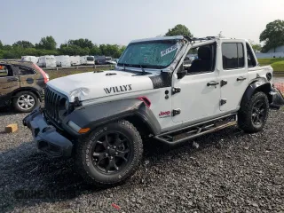 2021 Jeep Wrangler Unlimited 80th Anniversary z VIN 1C4HJXDG4MW794519, wystawiony jako Copart lot #60116105 z przebiegiem 25 708 mil mil oraz Szkoda całkowita • Salvage title. Historia ofert i sprzedaży dostępna na DreamBid. Obrazek 1.