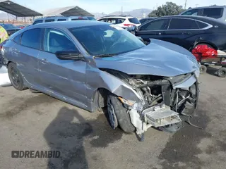 2019 Honda Civic Sedan LX with VIN 19XFC2F67KE203650, listed as a IAAI auction lot 41372503 with 128,034 mi miles. Bid and sale history available at carsss.com. Image 1.