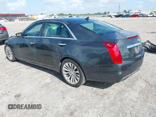 2014 Cadillac CTS Performance RWD with VIN 1G6AS5S36E0151499, listed as a IAAI auction lot 41945902 with 133,858 mi miles and . Bid and sale history available at DreamBid. Image 3.