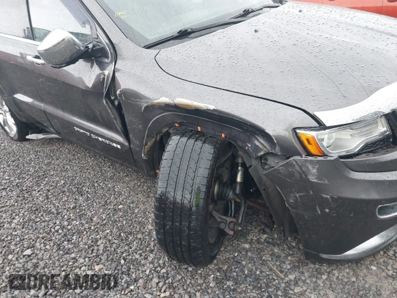 2015 Jeep Grand Cherokee Summit with VIN 1C4RJFJM6FC955904, listed as a IAAI auction lot 41483446 with 65,970 mi miles. Bid and sale history available at carsss.com. Image 6.