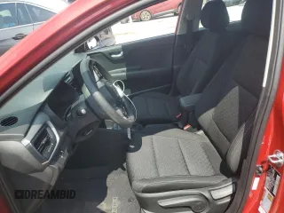 2023 Kia Rio S with VIN 3KPA24AD7PE607814, listed as a Copart auction lot 68135784 with 8,658 mi miles and Salvage Title. Bid and sale history available at DreamBid. Image 7.