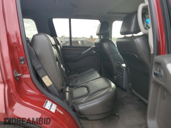 2009 Nissan Pathfinder LE z VIN 5N1AR18U39C601742, wystawiony jako Copart lot #53557095 z przebiegiem 205 775 mil mil oraz Szkoda całkowita • Salvage title. Historia ofert i sprzedaży dostępna na DreamBid. Obrazek 11.