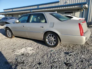 2009 Cadillac DTS 1SC z VIN 1G6KD57YX9U130916, wystawiony jako Copart lot #74964734 z przebiegiem 89 657 mil mil oraz Szkoda całkowita • Salvage title. Historia ofert i sprzedaży dostępna na DreamBid. Obrazek 2.