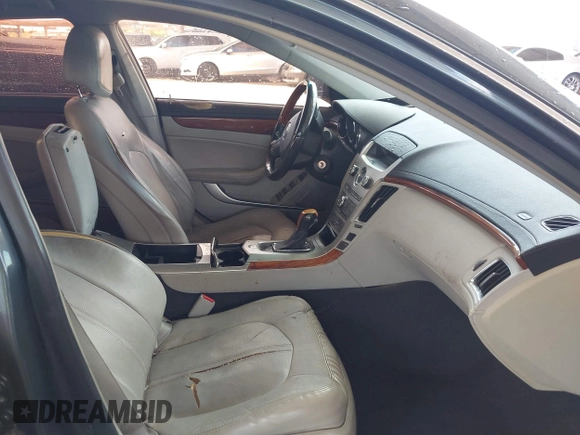2011 Cadillac CTS Luxury with VIN 1G6DF5EY6B0104932, listed as a IAAI auction lot 42032457 with 165,833 mi miles and . Bid and sale history available at DreamBid. Image 5.