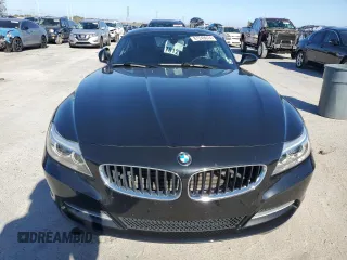 2015 BMW Z4 sDrive28i with VIN WBALL5C54FP557726, listed as a Copart auction lot 87249074 with 64,856 mi miles and Salvage Title. Bid and sale history available at carsss.com. Image 5.