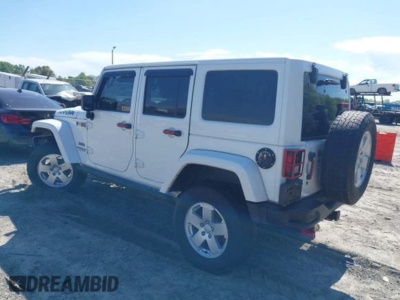 2017 Jeep Wrangler Unlimited Rubicon with VIN 1C4BJWFG9HL695361, listed as a IAAI auction lot 42010655 with 65,536 mi miles and . Bid and sale history available at DreamBid. Image 3.