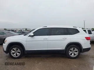 2018 Volkswagen Atlas SE с VIN 1V2DR2CA1JC587959, выставлен на аукционе IAAI как лот 42190292 с пробегом 93 832 миль миль и . История ставок и продаж доступна на DreamBid. Изображение 14.
