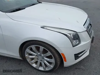 2015 Cadillac ATS Coupe Standard AWD with VIN 1G6AG1RX0F0127073, listed as a IAAI auction lot 41296448 with 119,718 mi miles. Bid and sale history available at carsss.com. Image 21.