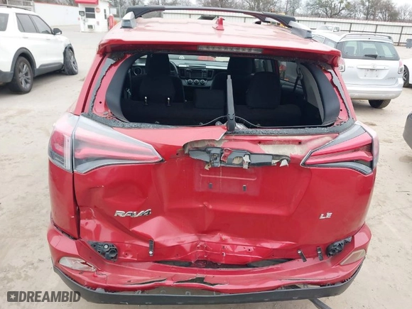 2016 Toyota RAV4 LE with VIN JTMZFREV4GJ063704, listed as a IAAI auction lot 41497086 with 153,748 mi miles. Bid and sale history available at carsss.com. Image 6.
