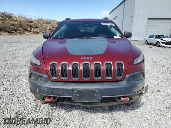 2014 Jeep Cherokee Trailhawk with VIN 1C4PJMBS7EW157305, listed as a Copart auction lot 49436685 with 138,446 mi miles and Salvage Title. Bid and sale history available at carsss.com. Image 5.