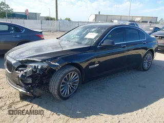 2012 BMW 7 Series 740i with VIN WBAKA4C51CC613636, listed as a IAAI auction lot 41908801 with 127,725 mi miles and . Bid and sale history available at carsss.com. Image 2.