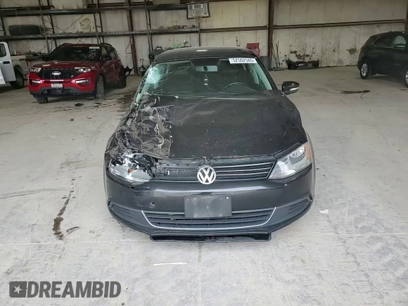 2013 Volkswagen Jetta SE with VIN 3VWDX7AJXDM427263, listed as a Copart auction lot 52502585 with 243,457 mi miles and Salvage title. Bid and sale history available at DreamBid. Image 10.