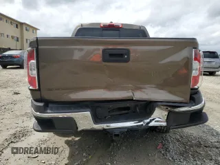 2015 GMC Canyon 4WD SLE with VIN 1GTG6BE38F1263139, listed as a Copart auction lot 75479854 with 124,765 mi miles and Salvage Title. Bid and sale history available at carsss.com. Image 6.