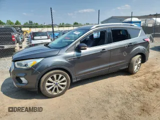 2018 Ford Escape Titanium with VIN 1FMCU9J90JUA15154, listed as a Copart auction lot 59768415 with 93,810 mi miles and Salvage title. Bid and sale history available at DreamBid. Image 1.