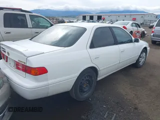 2000 Toyota Camry CE z VIN 4T1BG22KXYU948498, wystawiony jako IAAI lot #42247074 z przebiegiem 152 973 mil mil oraz . Historia ofert i sprzedaży dostępna na DreamBid. Obrazek 4.