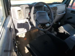 1998 Jeep Wrangler Sport with VIN 1J4FY19S2WP719595, listed as a Copart auction lot 73013584 with 190,056 mi miles and Salvage Title. Bid and sale history available at carsss.com. Image 8.