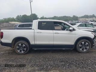 2018 Honda Ridgeline RTL-E with VIN 5FPYK3F77JB017293, listed as a IAAI auction lot 42422614 with 87,700 mi miles and . Bid and sale history available at DreamBid. Image 13.