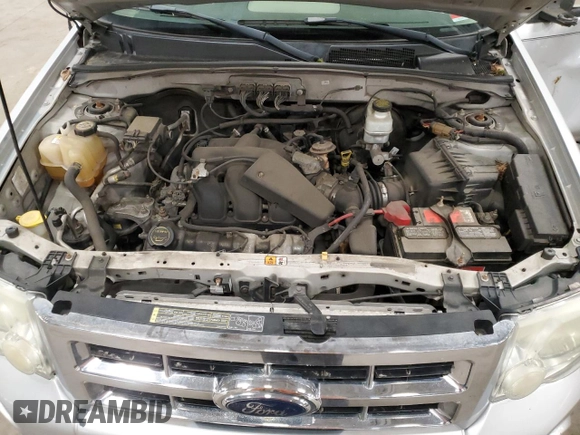 2008 Ford Escape XLT с VIN 1FMCU93128KD51496, выставлен на аукционе Copart как лот 57055865 с пробегом 204 224 миль миль и Списание • Salvage title. История ставок и продаж доступна на DreamBid. Изображение 12.