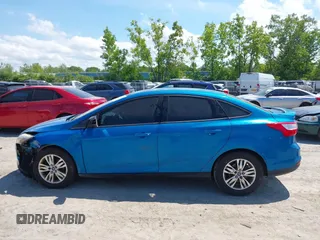 2012 Ford Focus SE with VIN 1FAHP3F28CL167157, listed as a IAAI auction lot 42381139 with 170,694 mi miles and . Bid and sale history available at DreamBid. Image 14.