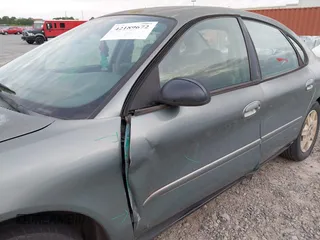2007 Ford Taurus SE z VIN 1FAFP53U67A148052, wystawiony jako IAAI lot #42189672 z przebiegiem 297 373 mil mil oraz . Historia ofert i sprzedaży dostępna na DreamBid. Obrazek 6.