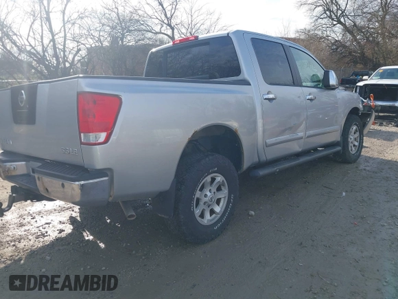 2005 Nissan Titan SE with VIN 1N6BA07B15N543247, listed as a IAAI auction lot 41152742 with 172,088 mi miles and . Bid and sale history available at DreamBid. Image 4.