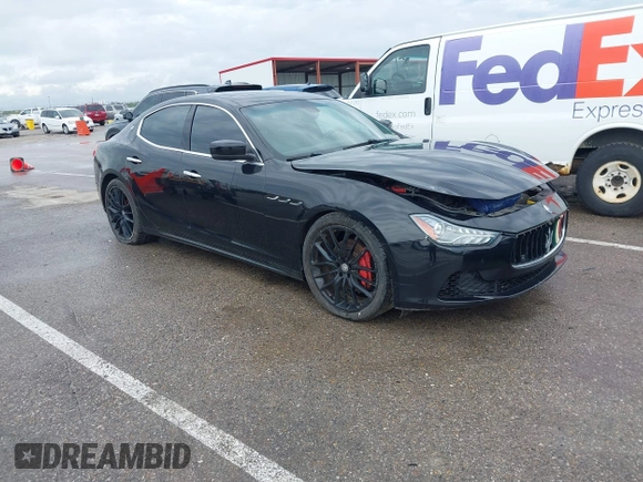 2014 Maserati Ghibli z VIN ZAM57XSA7E1091443, wystawiony jako IAAI lot #42163436 z przebiegiem 76 762 mil mil oraz . Historia ofert i sprzedaży dostępna na DreamBid. Obrazek 1.