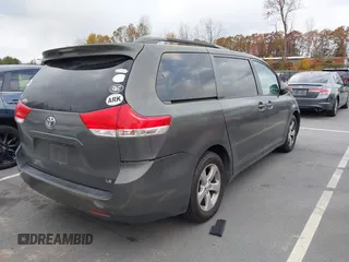 2012 Toyota Sienna LE AAS with VIN 5TDKK3DC5CS253020, listed as a IAAI auction lot 40900034 with 208,421 mi miles. Bid and sale history available at carsss.com. Image 4.