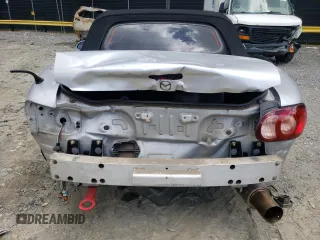 2004 Mazda MX-5 Miata LS with VIN JM1NB353640400140, listed as a Copart auction lot 56127165 with 123,276 mi miles and Salvage title. Bid and sale history available at DreamBid. Image 6.