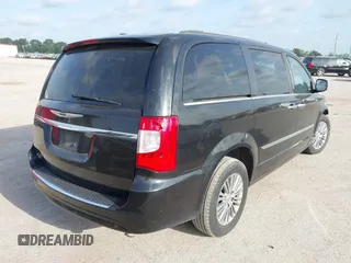 2013 Chrysler Town & Country Touring L with VIN 2C4RC1CG9DR778449, listed as a IAAI auction lot 42045779 with 217,776 mi miles and . Bid and sale history available at DreamBid. Image 4.