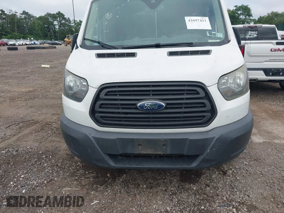 2016 Ford Transit Cargo with VIN 1FTYR2CM2GKA13205, listed as a IAAI auction lot 42697411 with 112,854 mi miles and . Bid and sale history available at DreamBid. Image 12.