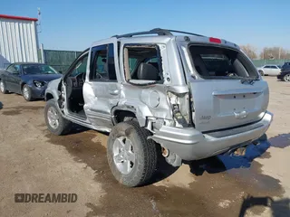 2004 Jeep Grand Cherokee Limited z VIN 1J4GW58S84C269863, wystawiony jako IAAI lot #41900325 z przebiegiem 226 587 mil mil oraz . Historia ofert i sprzedaży dostępna na DreamBid. Obrazek 3.