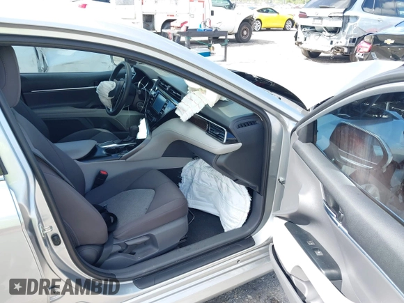 2019 Toyota Camry LE with VIN 4T1B11HK4KU249720, listed as a IAAI auction lot 41940728 with 35,891 mi miles and . Bid and sale history available at DreamBid. Image 5.