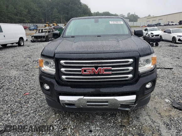 2015 GMC Canyon 4WD SLE with VIN 1GTG6BE37F1157166, listed as a Copart auction lot 71279914 with 114,484 mi miles and Salvage Title. Bid and sale history available at carsss.com. Image 5.