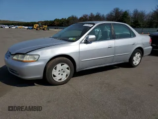 2002 Honda Accord LX z VIN 1HGCG16452A062131, wystawiony jako Copart lot #69125804 z przebiegiem 238 299 mil mil oraz Czysty tytuł • Clean title. Historia ofert i sprzedaży dostępna na DreamBid. Obrazek 1.