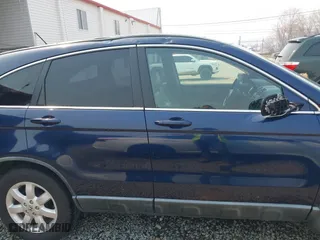 2009 Honda CR-V EX-L with VIN 5J6RE48759L010532, listed as a IAAI auction lot 41843362 with 112,651 mi miles. Bid and sale history available at carsss.com. Image 14.