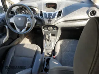2012 Ford Fiesta SE z VIN 3FADP4EJ4CM183237, wystawiony jako Copart lot #48825605 z przebiegiem 92 798 mil mil oraz Szkoda całkowita • Salvage title. Historia ofert i sprzedaży dostępna na DreamBid. Obrazek 8.