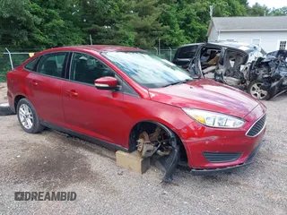 2016 Ford Focus SE z VIN 1FADP3F2XGL229484, wystawiony jako IAAI lot #39590948 z przebiegiem 66 047 mil mil oraz . Historia ofert i sprzedaży dostępna na DreamBid. Obrazek 1.
