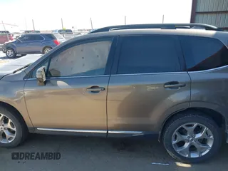 2017 Subaru Forester Touring z VIN JF2SJAWC8HH582683, wystawiony jako IAAI lot #42046369 z przebiegiem 71 070 mil mil oraz . Historia ofert i sprzedaży dostępna na DreamBid. Obrazek 13.