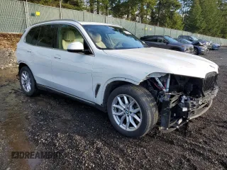 2021 BMW X5 xDrive45e with VIN 5UXTA6C04M9H52389, listed as a Copart auction lot 45605225 with 14,899 mi miles and Salvage Title. Bid and sale history available at carsss.com. Image 4.