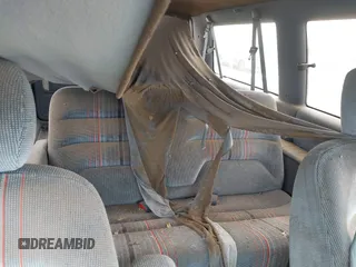 1991 Dodge Grand Caravan with VIN 1B4GK54R4MX558183, listed as a IAAI auction lot 41604086 with 210,400 mi miles and . Bid and sale history available at DreamBid. Image 8.