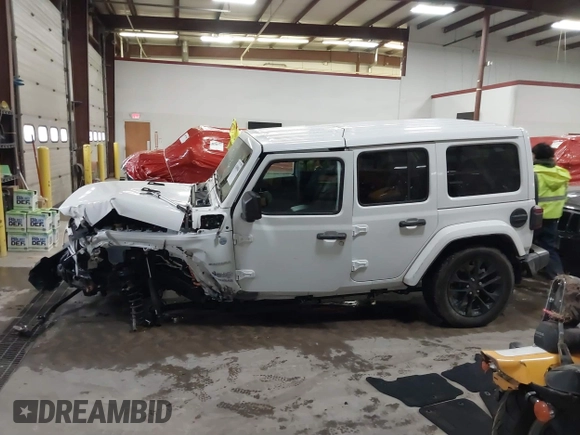 2021 Jeep Wrangler Unlimited Sahara with VIN 1C4JJXP60MW830307, listed as a IAAI auction lot 41869863 with 37,201 mi miles and . Bid and sale history available at DreamBid. Image 14.