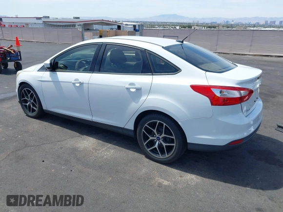 2012 Ford Focus SE with VIN 1FAHP3F24CL462319, listed as a IAAI auction lot 41981509 with 124,831 mi miles. Bid and sale history available at carsss.com. Image 3.