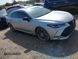 2019 Toyota Avalon XLE z VIN 4T1BZ1FB4KU004069, wystawiony jako IAAI lot #41921466 z przebiegiem 112 670 mil mil oraz . Historia ofert i sprzedaży dostępna na DreamBid. Obrazek 1.