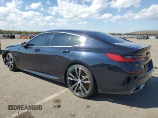 2020 BMW 8 Series M850i with VIN WBAGV8C02LCE34594, listed as a Copart auction lot 50389675 with 37,279 mi miles and Salvage title. Bid and sale history available at DreamBid. Image 2.